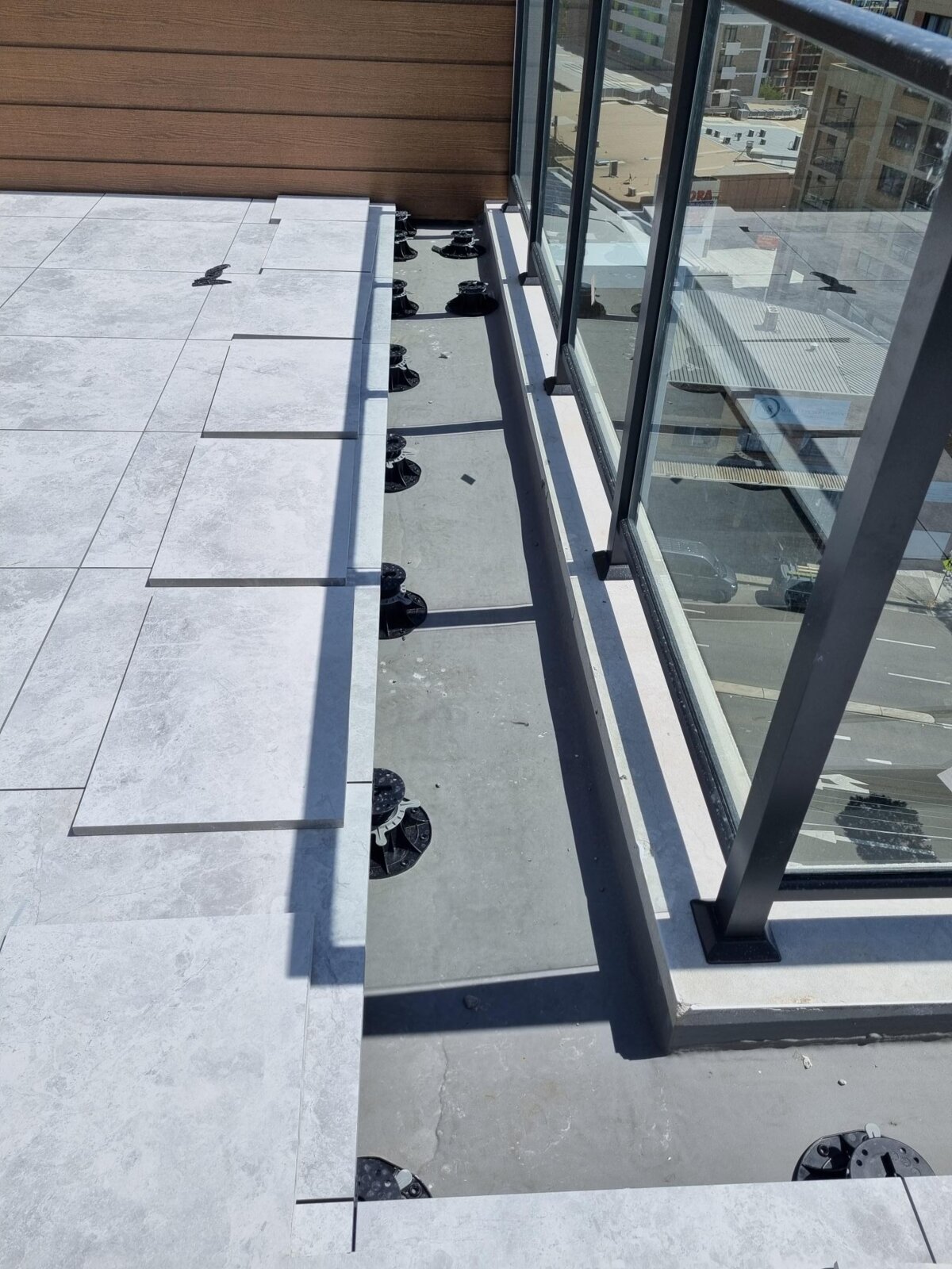 Construction works and dry leveling of terrace pavers