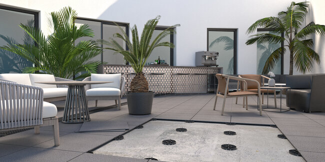 Terrace pavers on transparent support pads of fixed height laid on gravel