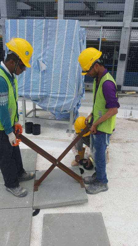 Laying concrete pavers on terrace pedestals solver