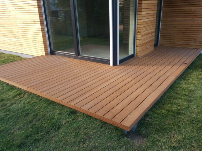 Finished composite terrace on the ground built on pedestals