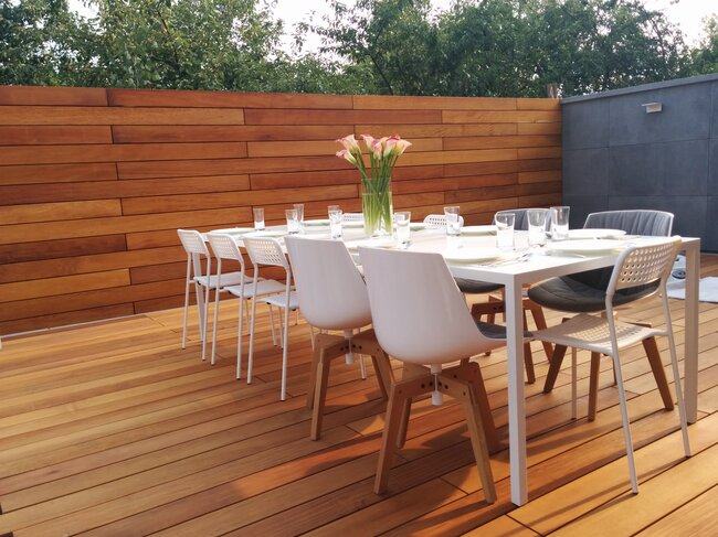 Raised deck terrace on adjustable pedestals with natural boards