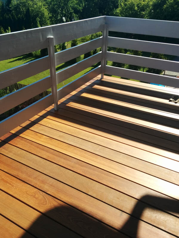 Elevated terrace with natural boards on the balcony
