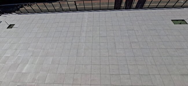 Terrace with pavers on a large surface ceramic gres tiles 2 cm