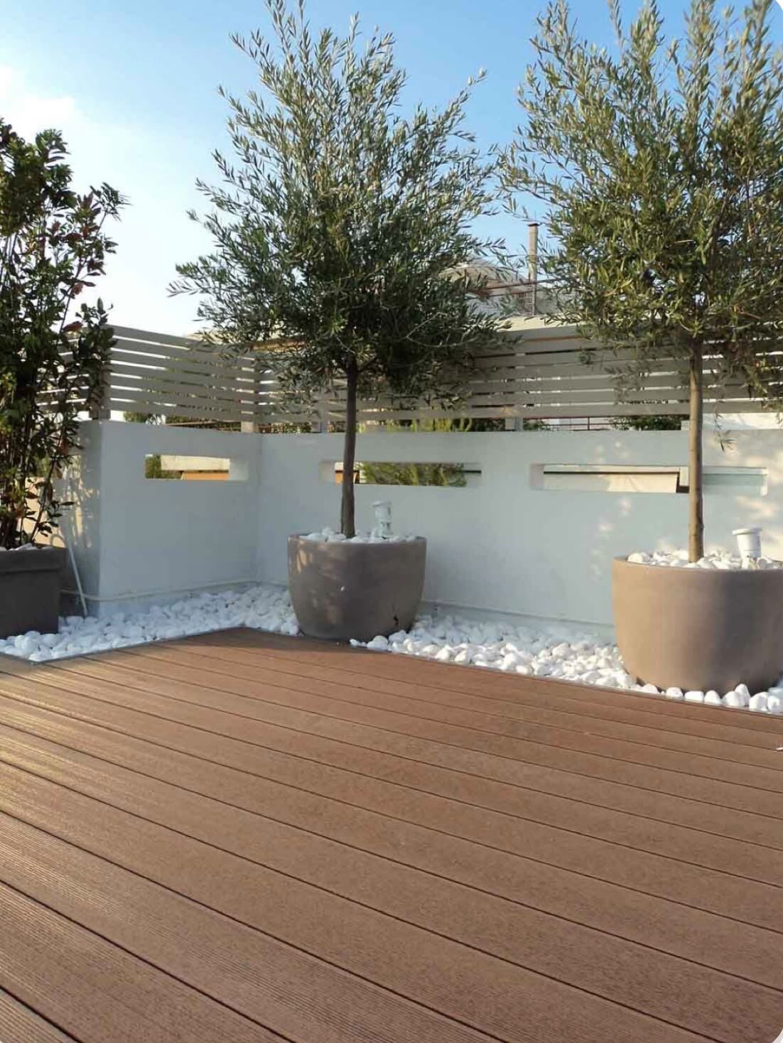 Wooden terrace with a set of garden furniture.
