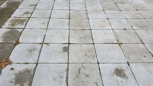 Concrete pavers laid on a raised deck terrace