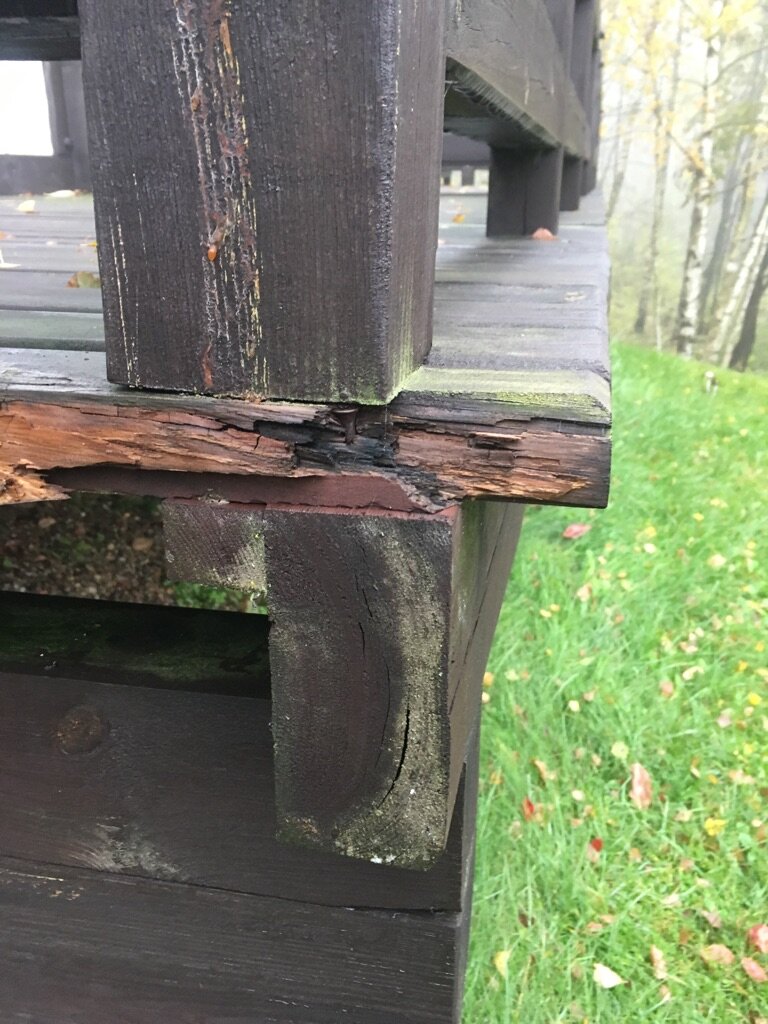 Damaged and rotted wooden terrace structure
