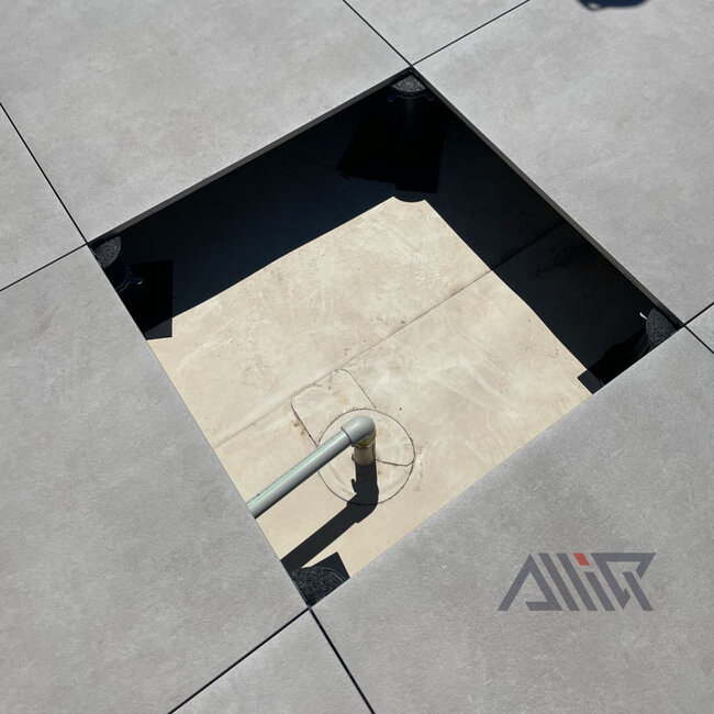 Construction of a raised deck terrace with pavers supported on adjustable pedestals