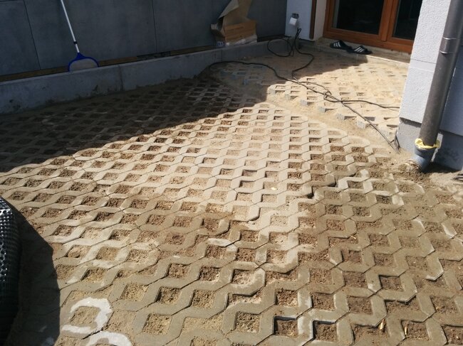 Substrate for the terrace made of concrete lattice slabs filled with sand