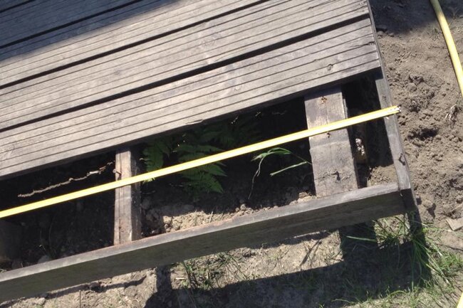 Old wooden terrace substructure requiring repair or replacement