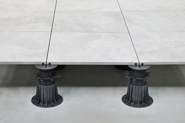 Installation of gres tiles on adjustable pedestals