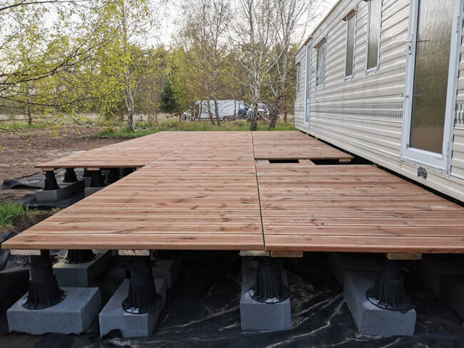 Wooden terrace on adjustable terrace pedestals