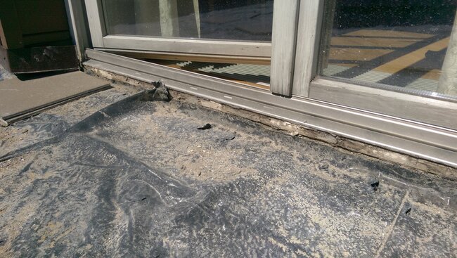 Renovation works on the roof terrace with visible waterproofing layer
