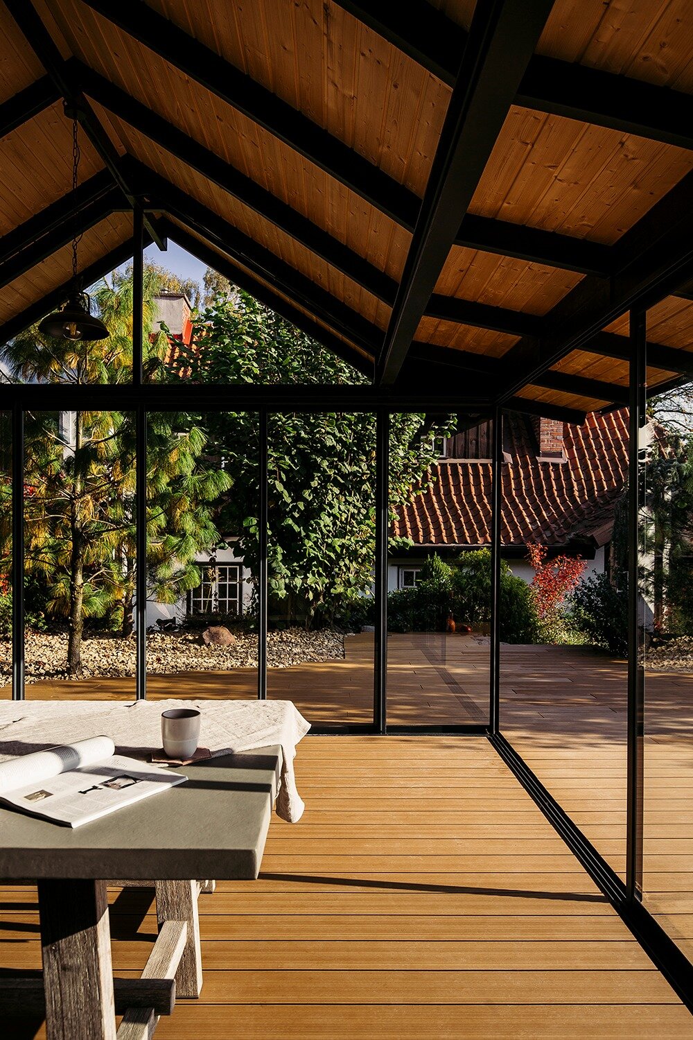 Wooden terrace with a view of the river and historic architecture