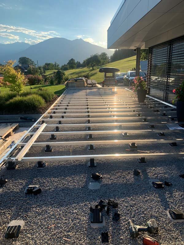 example of a floating terrace with joists on the ground on concrete screed