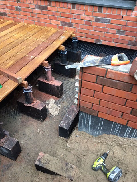 example of a floating terrace with joists on the ground on supports