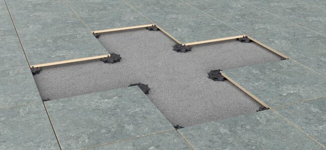 Visualization of a raised deck terrace on adjustable pedestals using pavers.