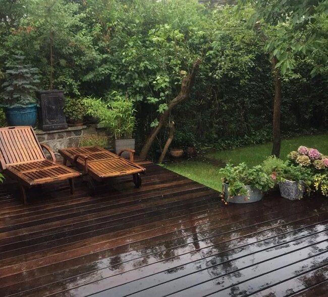 Photo during renovation of a terrace that was made using traditional adhesive technology