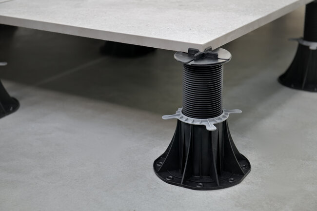 Photo of adjustable pedestals supporting terrace joists