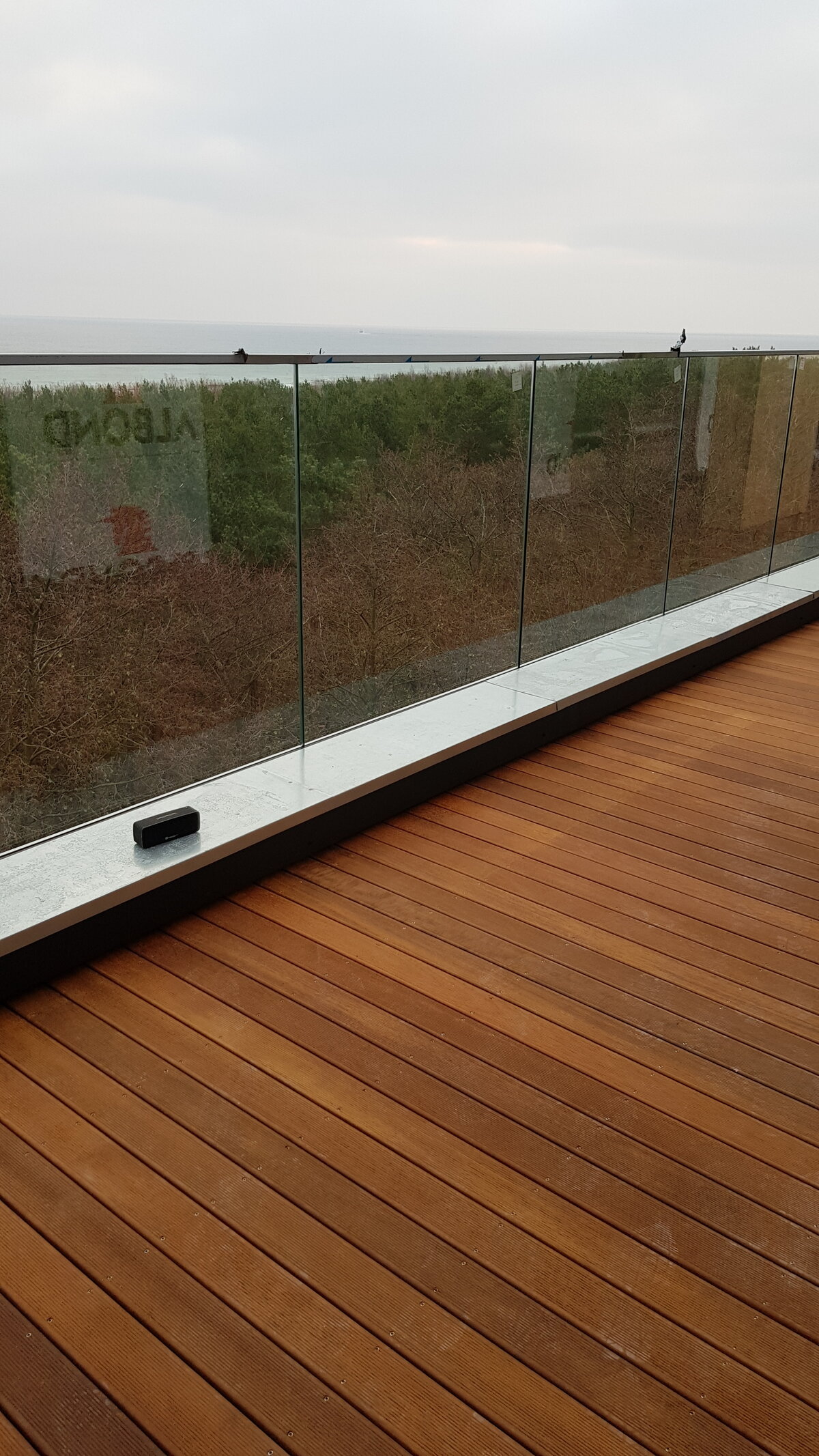 Visualization of a raised deck terrace using DeckSafe structural grids and artificial grass.
