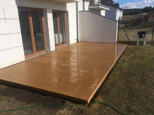 Ready-made raised deck terrace on the ground made with adjustable solver pedestals