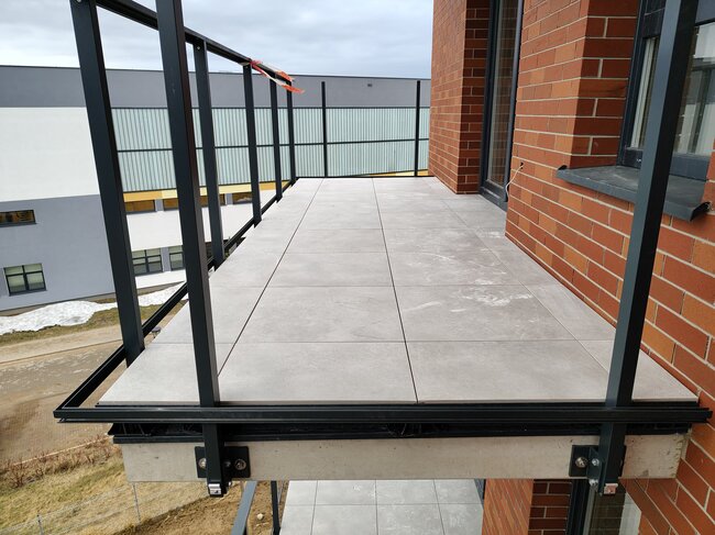 Elevated terrace on joists at a hotel investment