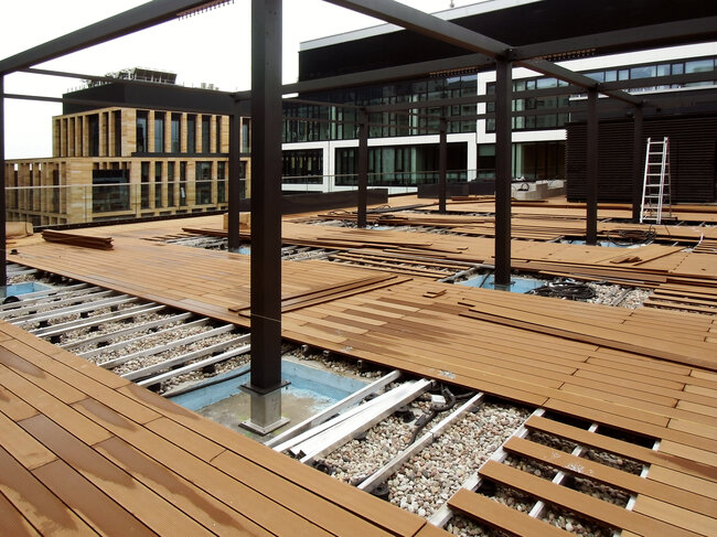 Flat roof with a usable terrace on an inverted roof with mounting pedestals