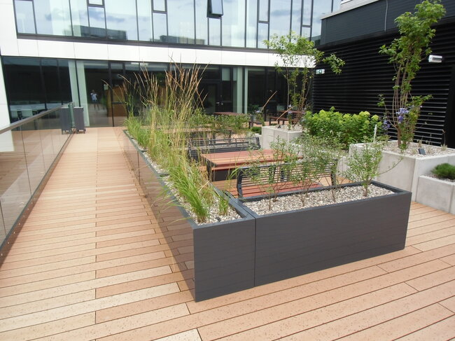 Planters on a usable roof on solver terrace pedestals