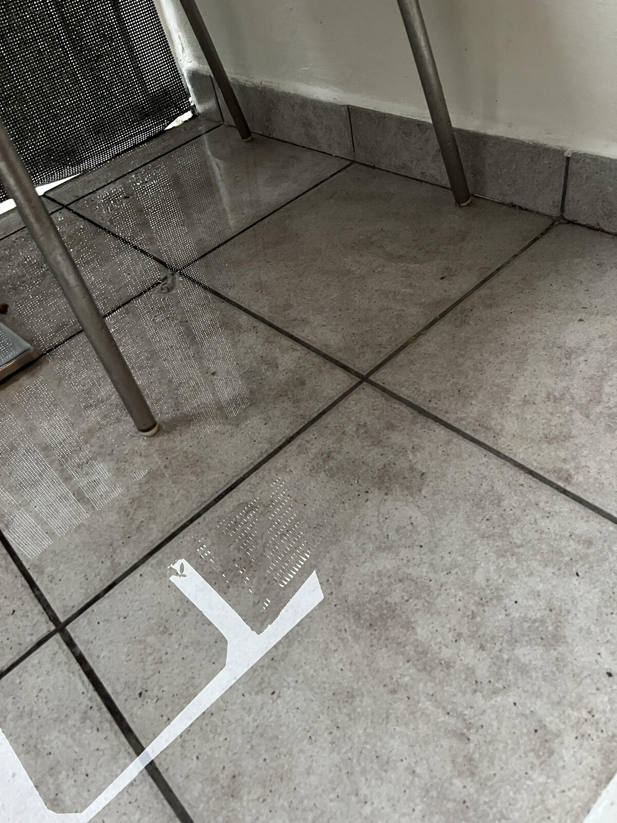 Wet terrace pavers with standing water