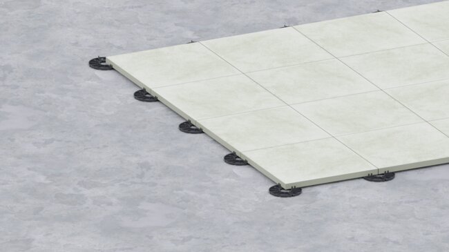 Fixed support pads for porcelain tiles on concrete screed