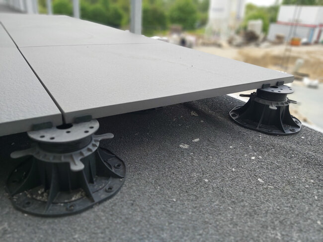 Elevated terrace on pedestals.