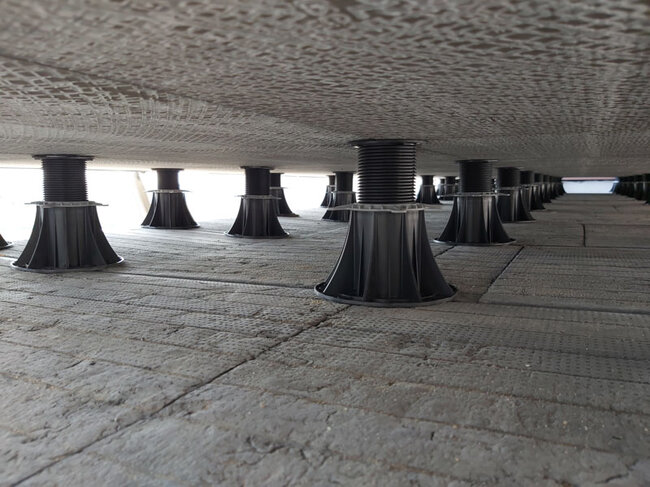 Installation of a fountain in a raised deck terrace system