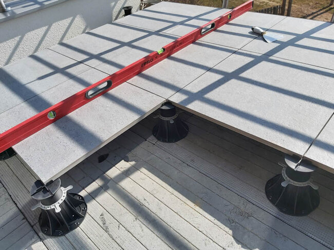 Pavers on a raised deck terrace on a flat roof
