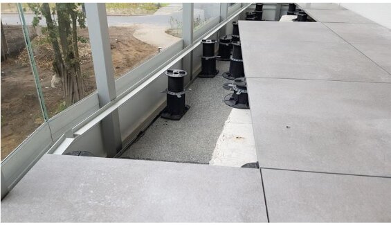 Step by step installation of terrace pavers on support pads 8