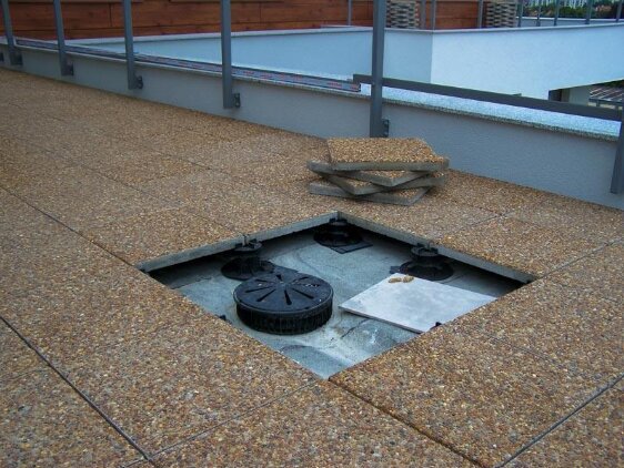 Step by step installation of terrace pavers on support pads 10