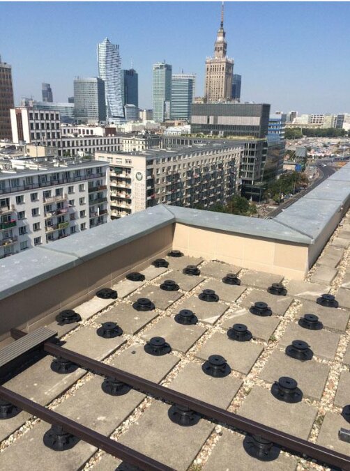 Step by step installation of terrace pavers on support pads 11