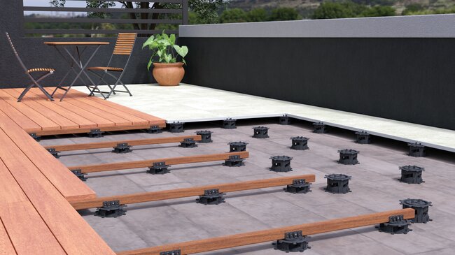`Substructure of a terrace with boards and ceramic pavers on SPIRAL pedestals`