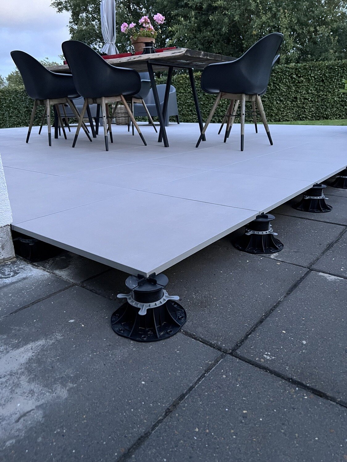 `Elevated terrace with gres pavers on adjustable pedestals`