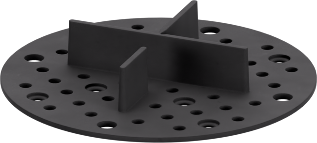 Round plastic pedestal spacer tab head with cross joint dividers for outdoor tile installation.