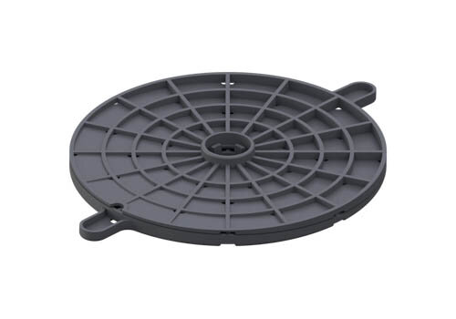 Grey circular slope corrector base for adjustable deck pedestals.