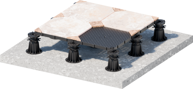 DeckSafe subfloor grid installed on adjustable pedestals with outdoor paver tiles.